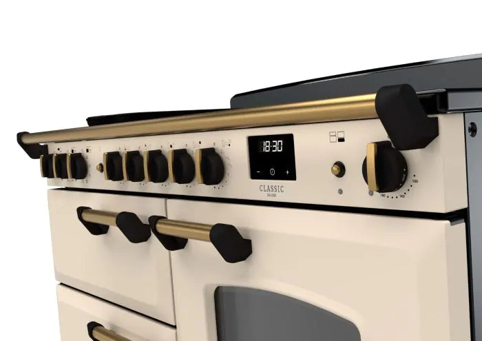 Rangemaster Classic Deluxe 110cm Induction Range Cooker - Pale Cream & Brass | CLDLO110EIPPCR/AB1